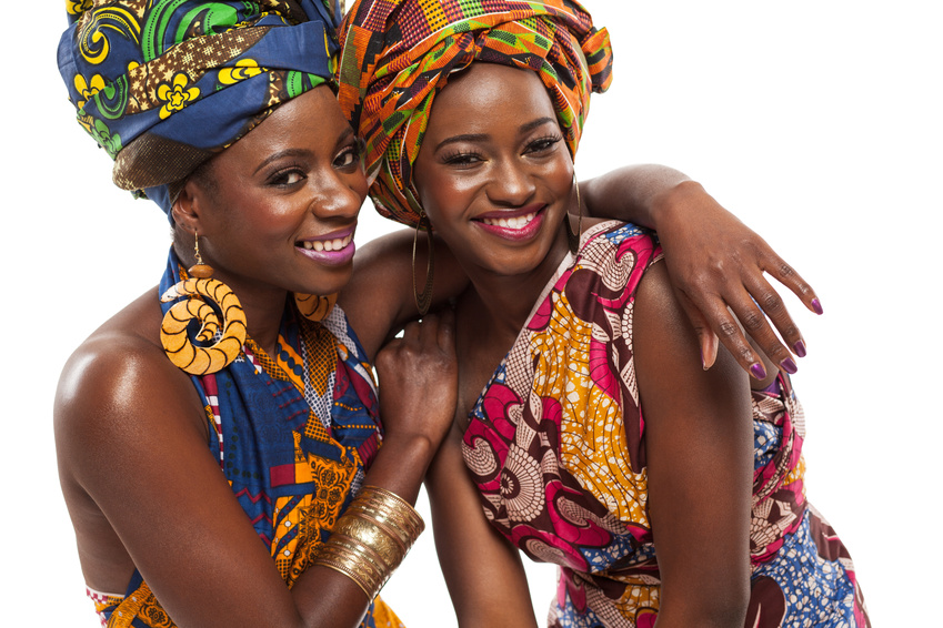 African female models posing in dresses.