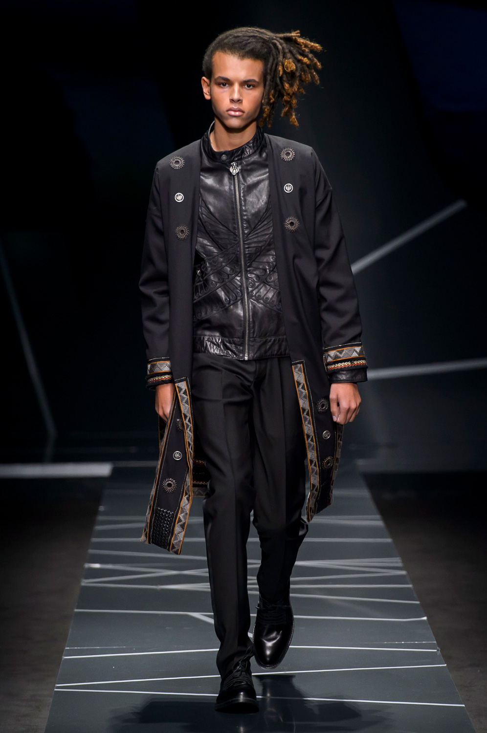 Man with brown Louis Vuitton backpack and black padded jacket before  Frankie Morello fashion show, Milan Fashion Week street style – Stock  Editorial Photo © AndreaA. #272367824